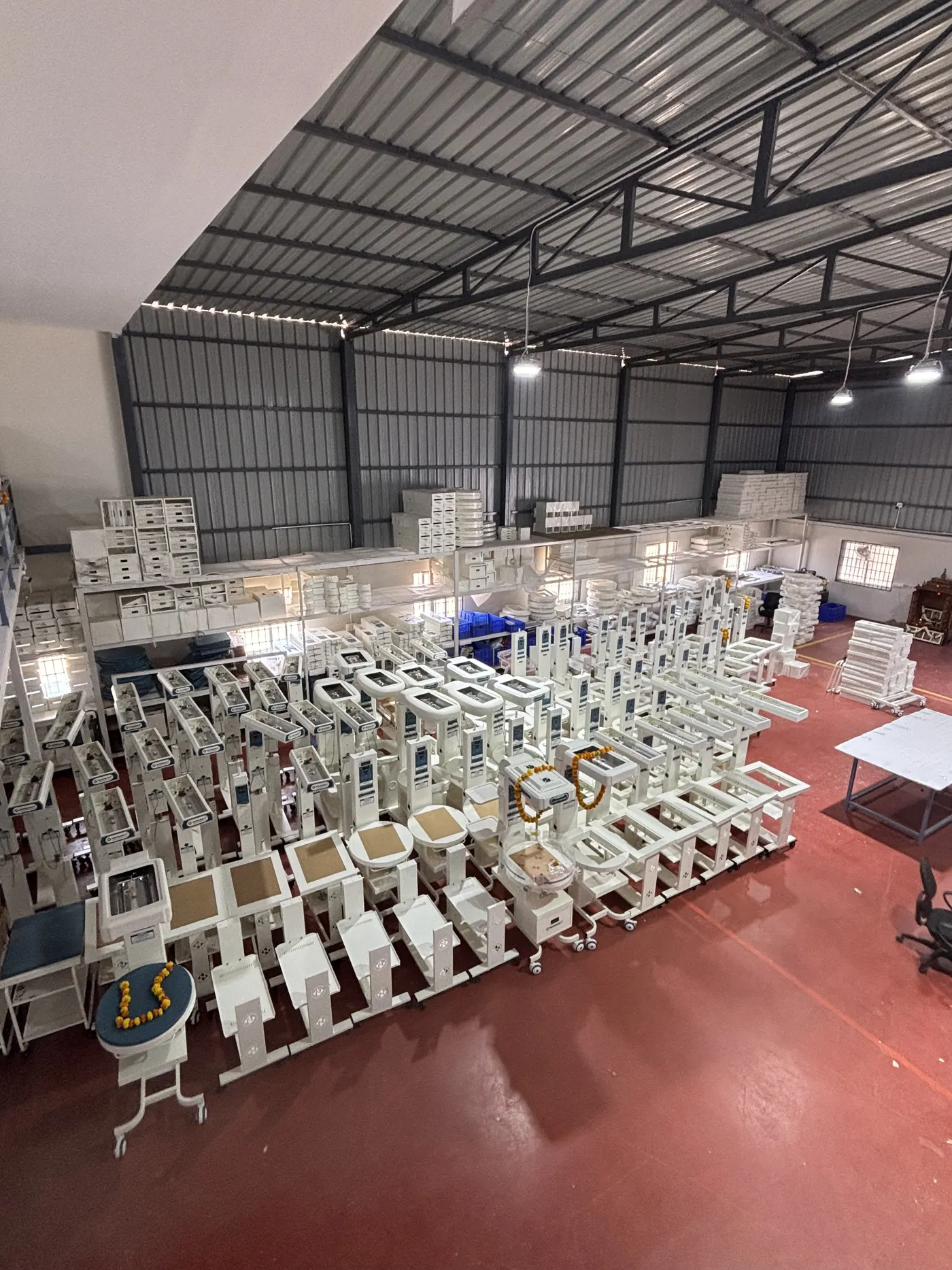 Batch of finished Shabari Metal Products enclosures stacked at a customer warehouse